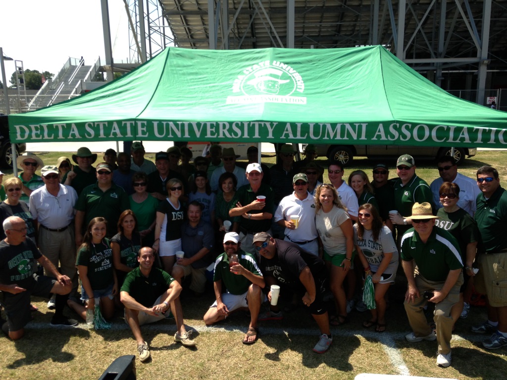 University friends tailgate at the Alumni Association tent in Itta Bena. 